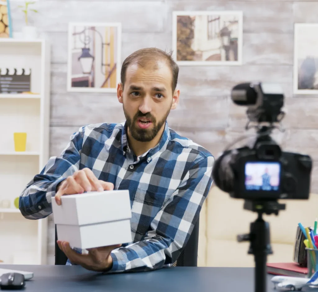 famous-young-influencer-recording-the-unboxing-of-a-phone